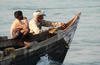 Fisherman and young apprentice