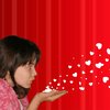 Girl blowing hearts