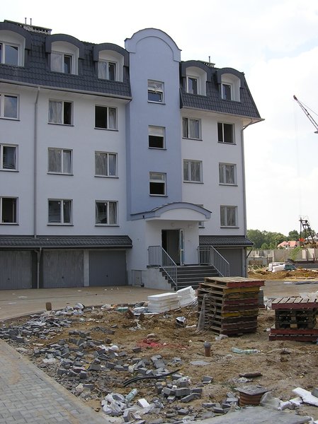 Moving in to a new building: A new flats are ready, but the surrounding terrain not quite.Please mail me or comment this photo if you liked/used it. Thanks!I would be happy to receive the information about picture usage. I would be extremely happy to see the final work even if you th