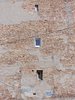 Slums / Old wall with windows