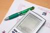 Calculator, ballpoint pen, and
