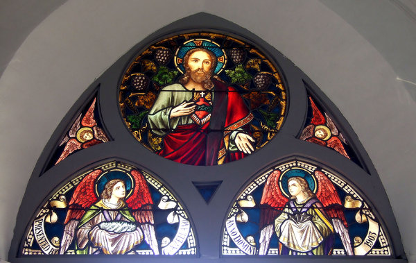 underneath the arches: arched stained glass windows