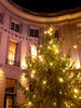 cristmas tree in front of thea