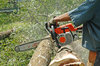 Chainsaws in action. 1