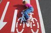 Kid fun on road marked bicycle