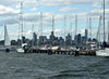 masts before the city