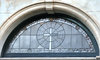 arched window and cross