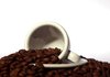 Coffee beans and an espresso c
