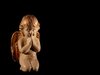 An angel praying