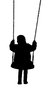 Silhouette child on a swing
