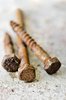 Three rusty screws