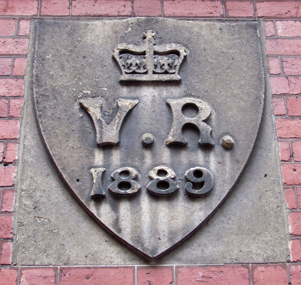 when Victoria was Queen1: dated wall stone of historic building constructed during the reign of Queen Victoria