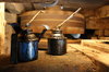 Two oil cans