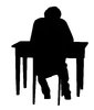 A man behind the desk