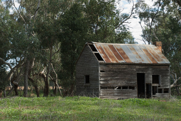 rural: an old rundown house on farm property