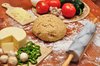 Pizza dough and ingredients
