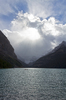 Radiant storm cloud over lake