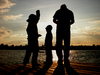 silhouettes on the lake
