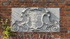 Ornamental stone crest