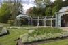 English garden with aviary