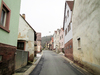rural street /wheathered house